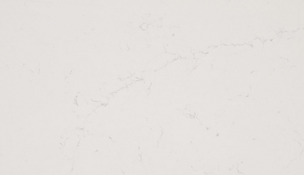 Alabaster White quartz slab showcasing a creamy white base and delicate grey veining, perfect for countertops in Lisle homes Alabaster White quartz slab with creamy white base and delicate grey veining, ideal for countertops in Lisle homes