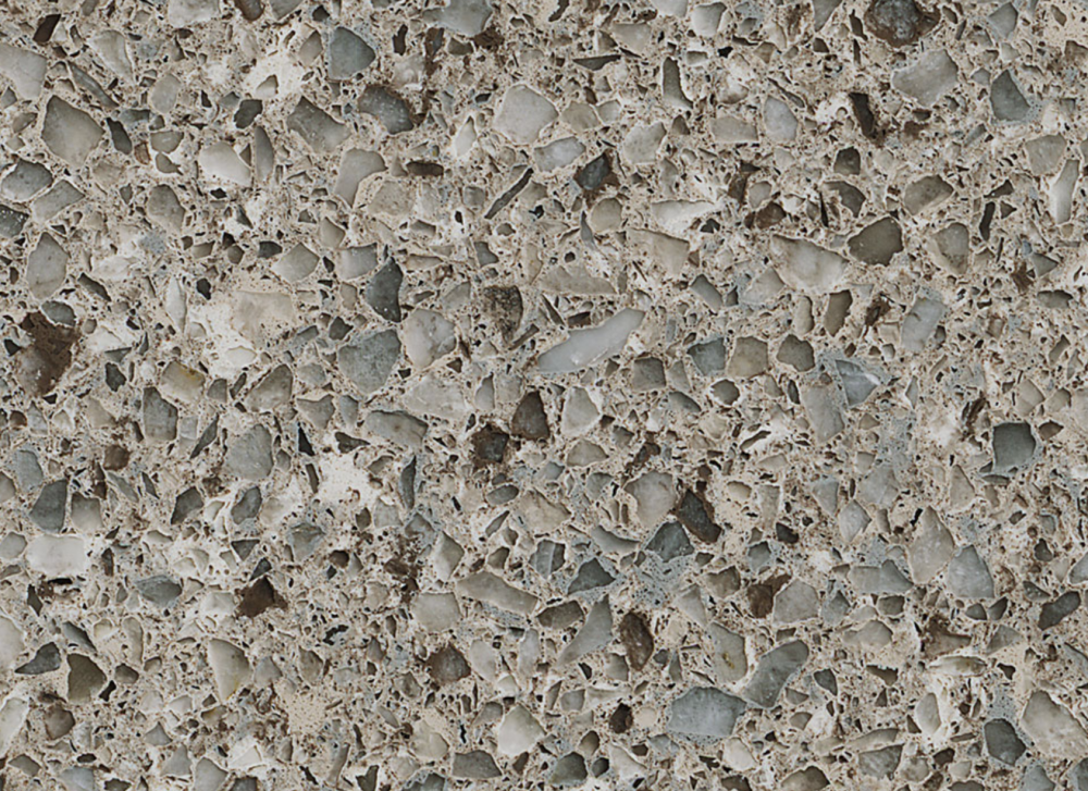 Alpine quartz slab featuring a beige and taupe background with large aggregate pieces for countertops in Villa Park Alpine quartz slab with beige and taupe background and large aggregate pieces, ideal for countertops in Villa Park homes