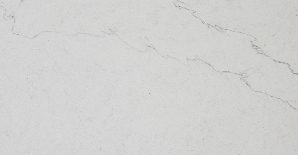 Sophisticated Calacatta Alto quartz slab featuring a clean white base accented with soft grey veining for countertops in Berwyn Calacatta Alto quartz slab with subtle white background and soft grey veining, ideal for countertops in Berwyn homes