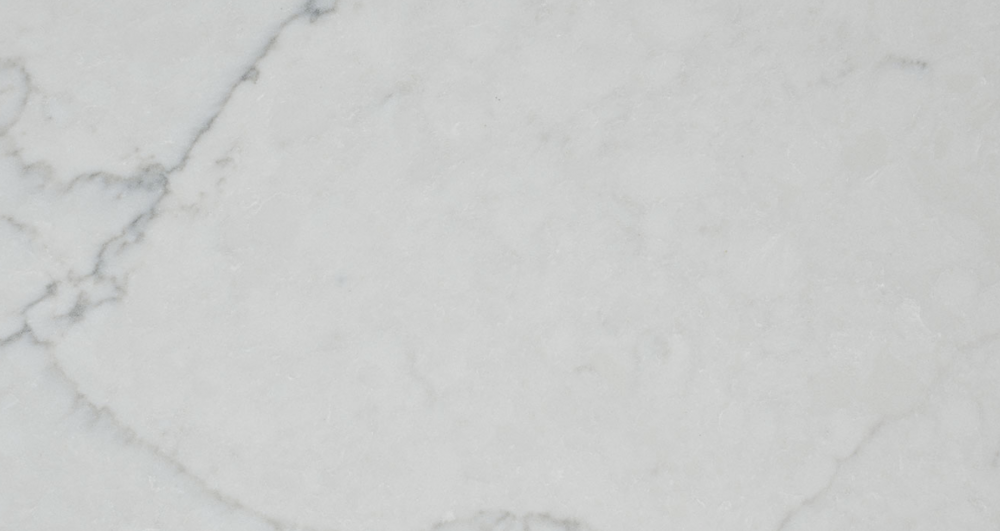 Calacatta Monaco quartz slab featuring soft gray veining on a white background for countertops in Lake Forest Calacatta Monaco quartz slab with soft gray veins on a white background, ideal for countertops in Lake Forest homes