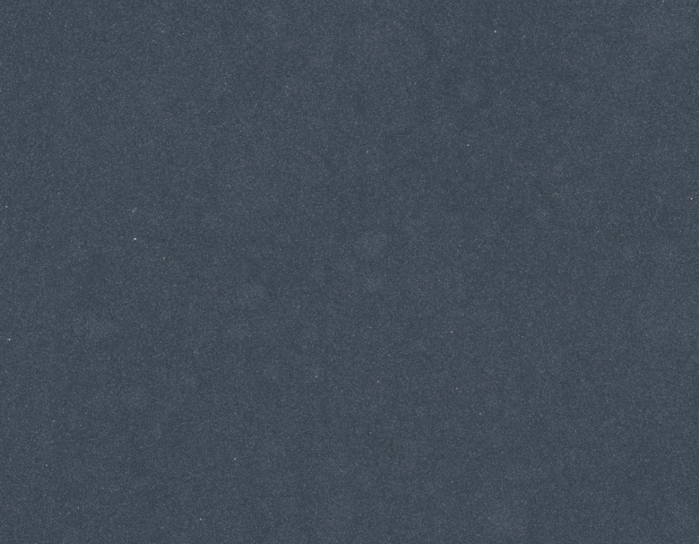 Daron quartz slab featuring a deep charcoal blue background with subtle textured speckles in Vernon Hills Daron quartz slab with a deep charcoal blue background and subtle textured speckles in Vernon Hills