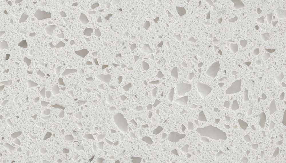 Iced White quartz slab featuring a crisp white base with translucent quartz pieces, perfect for countertops and backsplashes in Highland Park Iced White quartz slab with a crisp white base and translucent quartz pieces, ideal for countertops in Highland Park homes