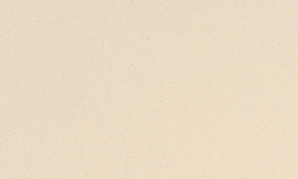 Warm and inviting Ivory Cream quartz slab showcasing a soft cream base with delicate beige speckles, perfect for countertops and backsplashes. Ivory Cream quartz slab with warm cream background and subtle beige speckles