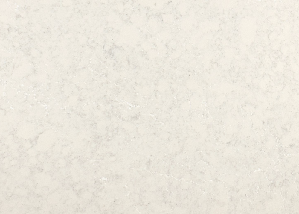 Malvern quartz slab featuring a soft cream base and subtle pale grey speckling in Villa Park Malvern quartz slab with a soft cream base and subtle pale grey speckling in Villa Park
