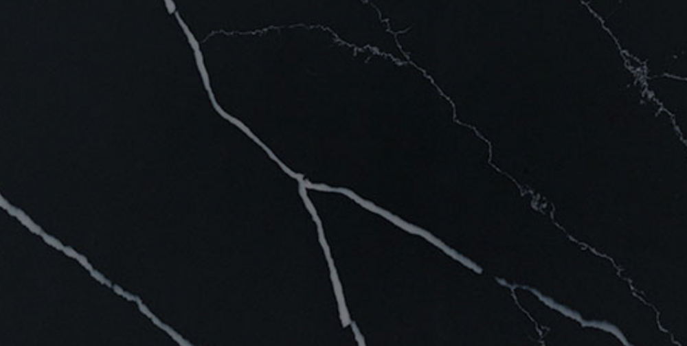 Dramatic Marquina Midnight quartz slab with a rich black base and bold white veining, perfect for luxurious countertops and accent walls in Lake Forest Marquina Midnight quartz slab featuring an intense black surface accented by brilliant white veining, perfect for countertops in Lake Forest homes