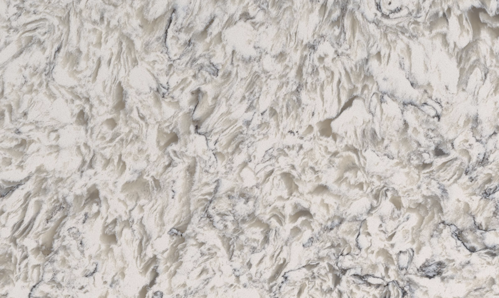 Montclair White quartz slab offering a blend of warm beige and cream hues with delicate grey patterning, suitable for countertops and decorative surfaces in Oak Park Montclair White quartz slab showcasing warm beige tones with subtle cream and grey patterning, perfect for countertops in Oak Park homes