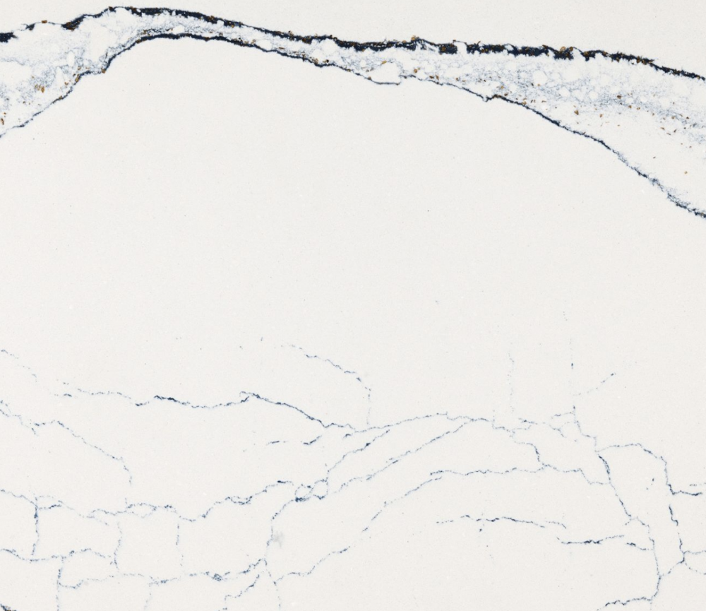 Portrush quartz slab featuring a crisp white background and striking navy and gray veins forming a dramatic wave in Elmhurst Portrush quartz slab with a crisp white background and striking navy and gray veins forming a dramatic wave in Elmhurst