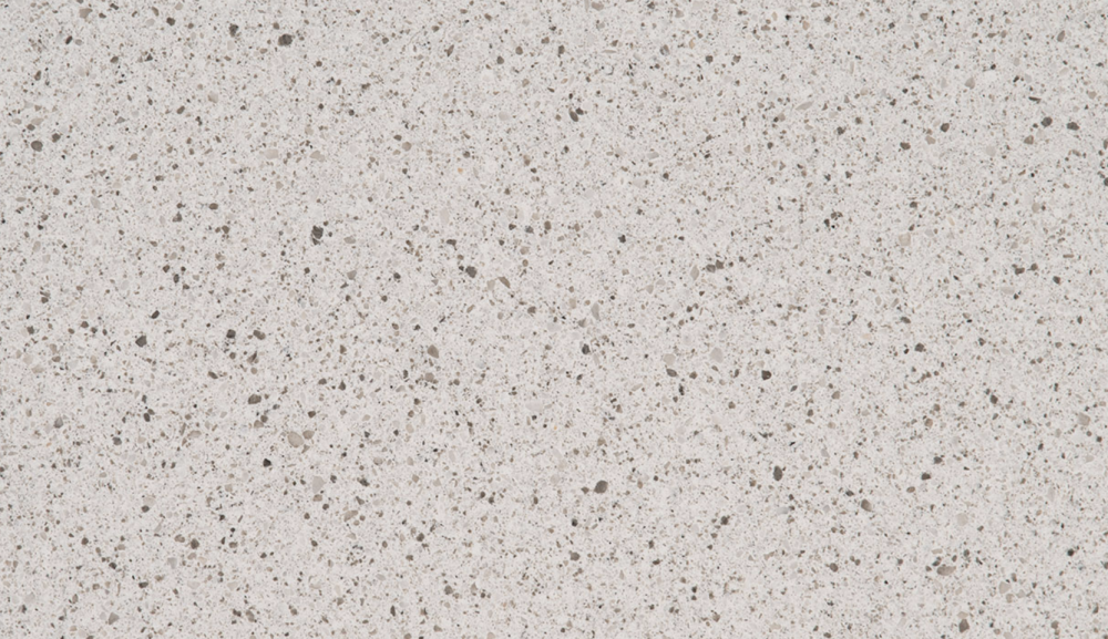 Peppercorn White quartz slab featuring a warm white base with subtle pepper-like speckles, suitable for countertops and backsplashes in Northbrook Peppercorn White quartz slab with a warm white background and subtle pepper-like speckles, ideal for countertops in Northbrook homes
