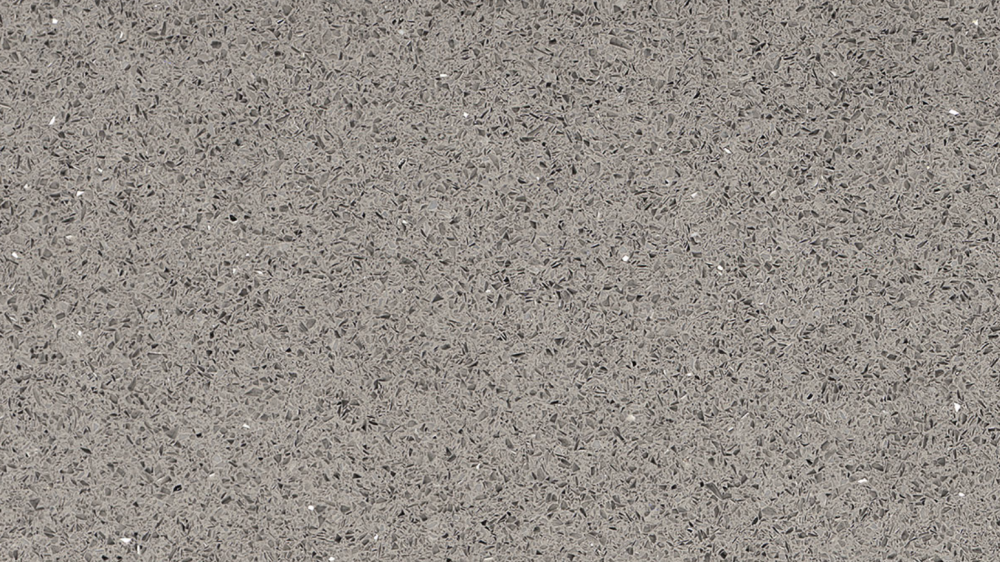 Stellar Gray quartz slab featuring a uniform mid-gray tone with subtle speckles for countertops in Deerfield Stellar Gray quartz slab with a consistent mid-gray tone and subtle speckles, ideal for countertops in Deerfield homes