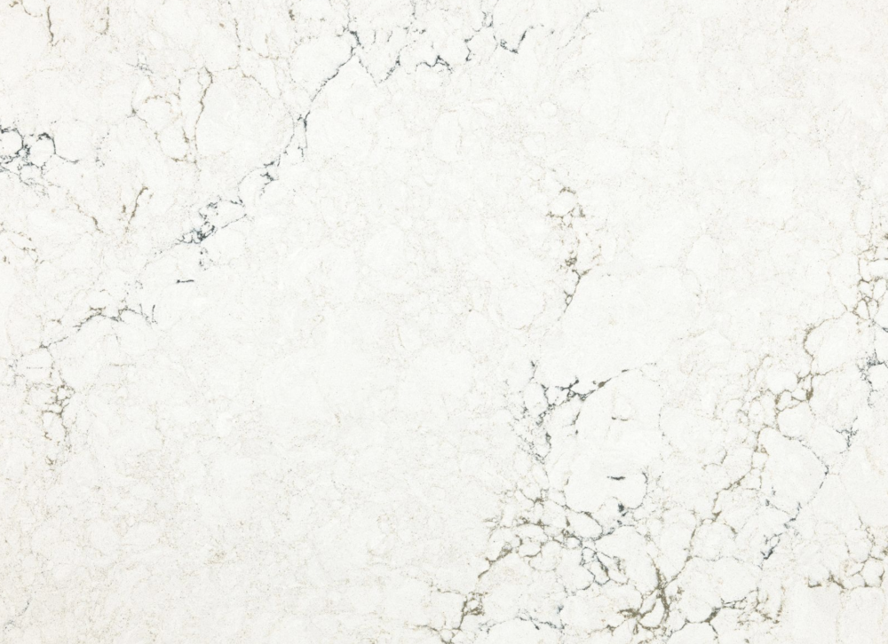 Whitendale quartz slab sample showing a cream backdrop and subtle veining in Hinsdale Whitendale quartz slab with a cream background and delicate veining in Hinsdale