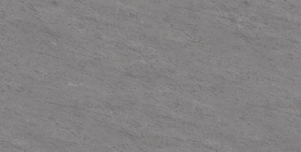 Basalto Light porcelain slab featuring cool light grey tones with subtle speckled texture for countertops in Arlington Heights Basalto Light porcelain slab with cool light grey tones and subtle speckled texture, ideal for countertops in Arlington Heights homes