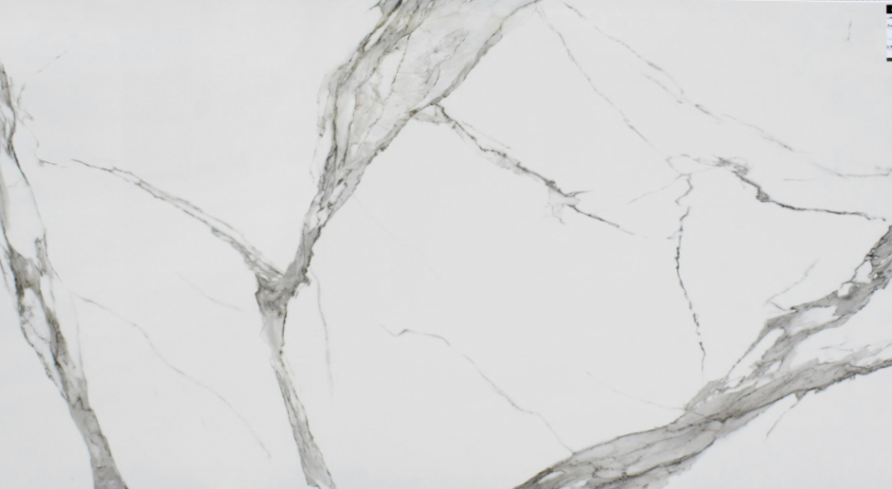 Calacatta Extra porcelain slab featuring refined grey veining on a clean white background for Mount Prospect countertops Calacatta Extra porcelain slab with refined grey veining on a clean white background, ideal for countertops in Mount Prospect homes