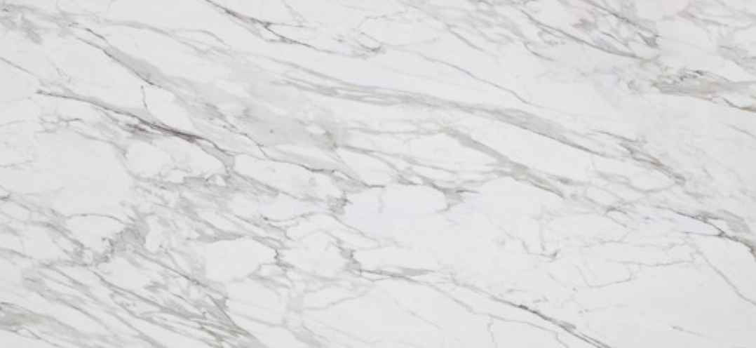 Calacatta WOW porcelain slab featuring bold grey and gold veining on a bright white background for Northbrook countertops Calacatta WOW porcelain slab with bold grey and gold veining on a bright white background, ideal for countertops in Northbrook homes