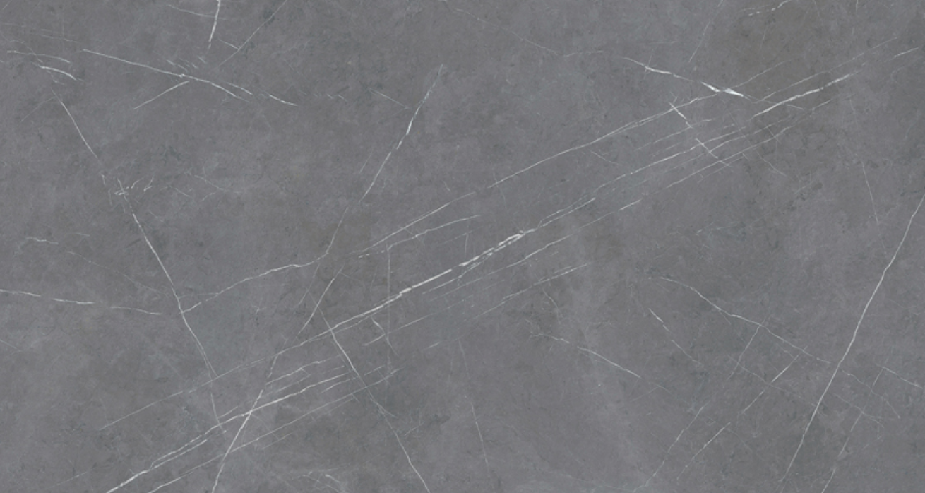 Pietra Grey porcelain slab with dark grey base and fine white veining, ideal for Skokie countertops Pietra Grey porcelain slab featuring a deep grey background with fine white veining, perfect for countertops in Skokie homes